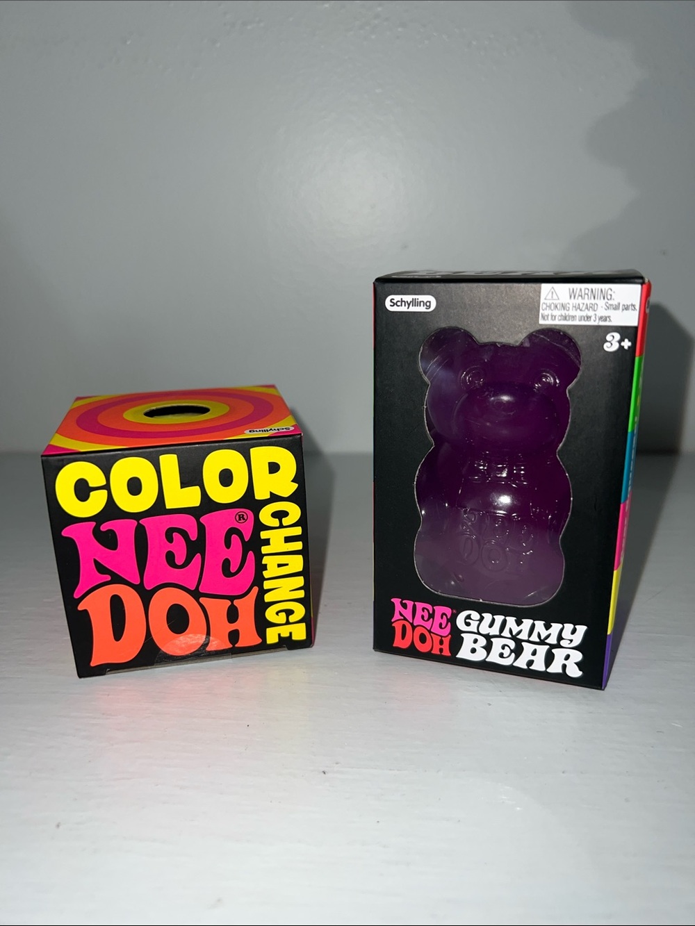 NeeDoh authentic NeeDoh gummy bear and color change gooey glob.